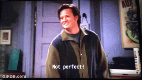 A Man In A Jacket Says " Not Perfect " On A Television Screen GIF