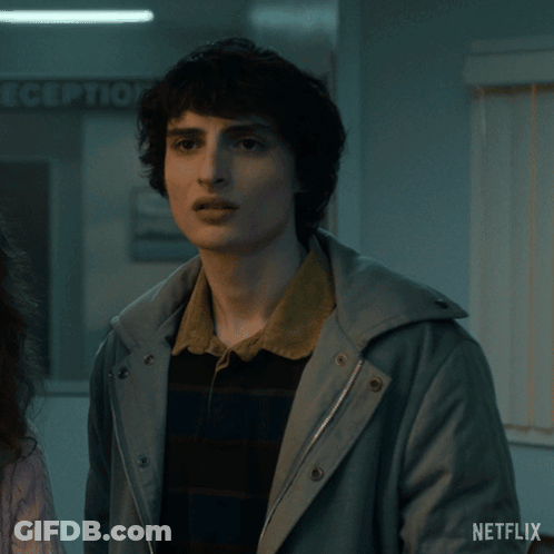 A Man In A Jacket Says " What Now " GIF