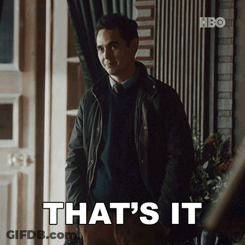 A Man In A Jacket Stands In Front Of A Sign That Says " That 'S It " GIF