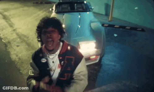 A Man In A Jacket With The Letter A On It GIF