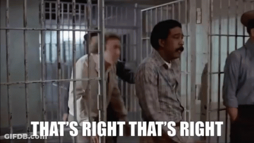 A Man In A Jail Cell With The Words `` That 'S Right That 'S Right '' Written On It . GIF