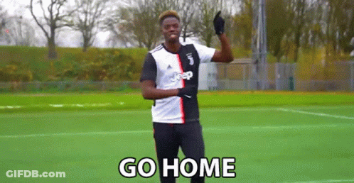 A Man In A Jeep Jersey Is Standing On A Soccer Field And Says Go Home . GIF