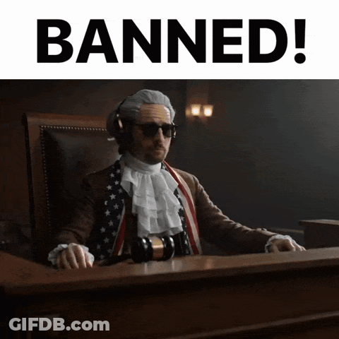 A Man In A Judge 'S Chair With The Words Banned Behind Him GIF