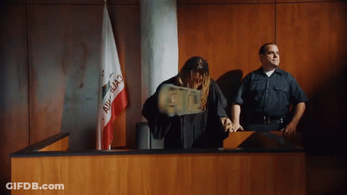 A Man In A Judge 'S Robe Is Throwing Money In A Courtroom With A California Flag In The Background GIF