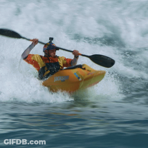 A Man In A Kayak With Jackson On The Side Of It GIF