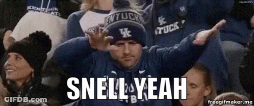 A Man In A Kentucky Hat Says Snell Yeah In A Crowd Of People GIF