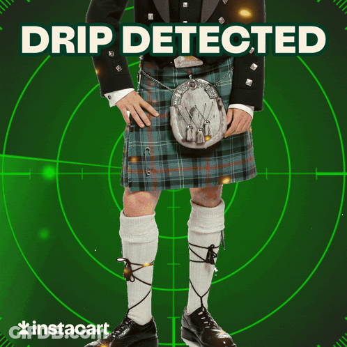 A Man In A Kilt Is Standing In Front Of A Green Target That Says Instacart GIF