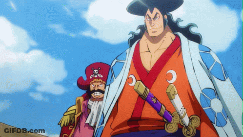 A Man In A Kimono Is Holding A Purple Sword With The Letter C On It GIF