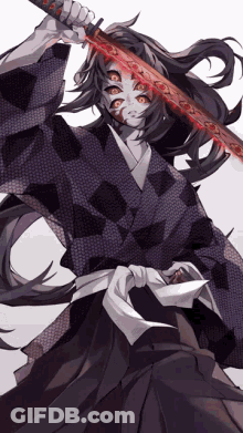 A Man In A Kimono Is Holding A Sword GIF