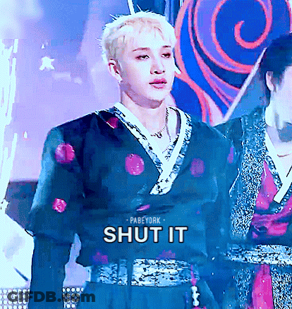 A Man In A Kimono With The Words Shut It On The Bottom GIF