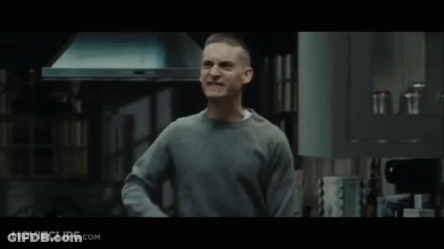A Man In A Kitchen With Movieclips.com Written On The Bottom Of The Screen GIF