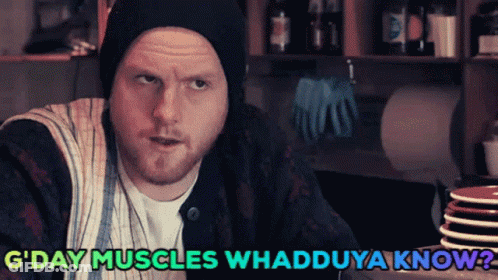 Man In Kitchen With G Day Muscles GIF