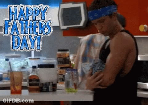 A Man In A Kitchen With The Words Happy Father 'S Day Written On The Top GIF