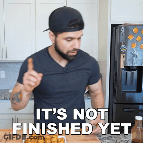 A Man In A Kitchen With The Words " It 'S Not Finished Yet " GIF