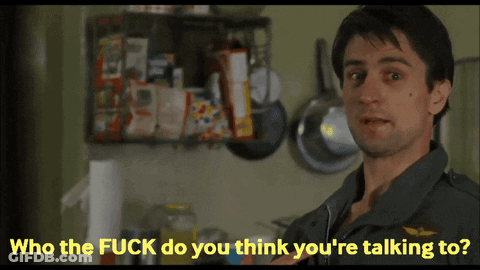 A Man In A Kitchen With The Words " Who The Fuck Do You Think You 'Re Talking To " Below Him GIF