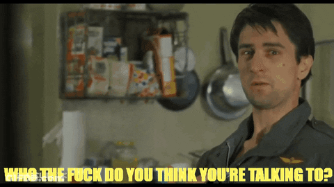 A Man In A Kitchen With The Words Who The Fuck Do You Think You 'Re Talking To Below Him GIF