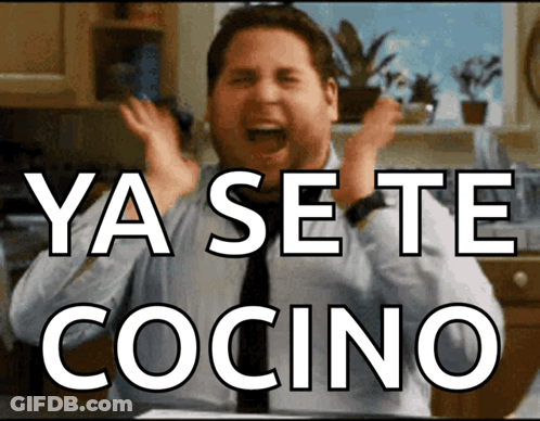 A Man In A Kitchen With The Words Ya Se Te Cocino Written Above Him GIF
