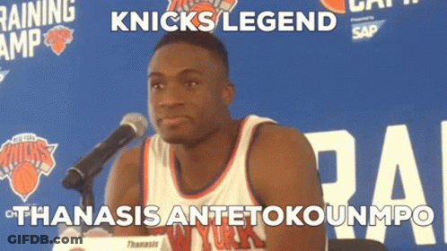 A Man In A Knicks Jersey Stands In Front Of A Microphone With The Caption Knicks Legend GIF
