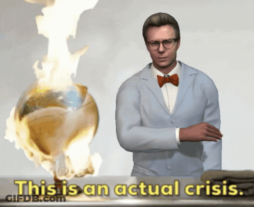 A Man In A Lab Coat And Bow Tie Stands In Front Of A Globe On Fire With The Words This Is An Actual Crisis GIF