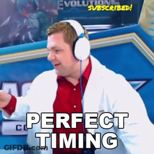 A Man In A Lab Coat And Headphones Says Perfect Timing . GIF