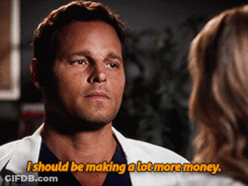 A Man In A Lab Coat Talks To A Woman And Says I Should Be Making A Lot More Money GIF