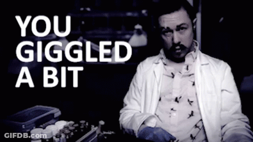 A Man In A Lab Coat With The Words You Giggled A Bit Above Him GIF