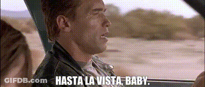 A Man In A Leather Jacket Is Driving A Car And Saying `` Hasta La Vista , Baby '' . GIF