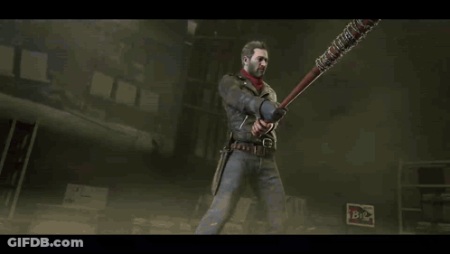 A Man In A Leather Jacket Is Holding A Large Axe GIF