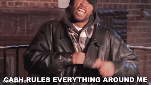 A Man In A Leather Jacket Is Saying " Cash Rules Everything Around Me " GIF