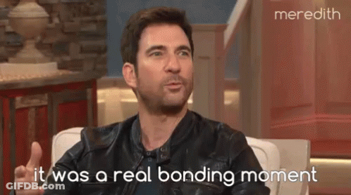 Man In Leather Jacket Talking To Woman On TV Show GIF