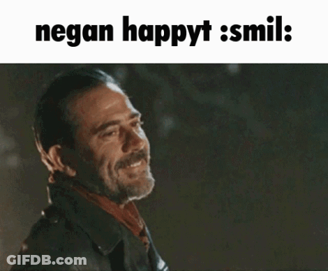 A Man In A Leather Jacket Is Smiling With The Words Negan Happyt Smil GIF