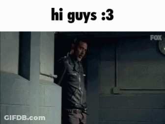 A Man In A Leather Jacket Is Standing In A Doorway With The Words Hi Guys 3 Above Him GIF