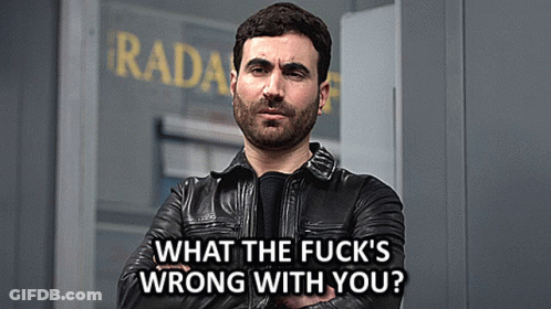 A Man In A Leather Jacket Is Standing In Front Of A Radar Sign GIF