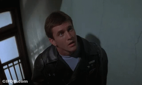 A Man In A Leather Jacket Says " Any Longer Out On That Road And I 'M One Of Them " GIF