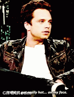 A Man In A Leather Jacket Says It Got Really Hot On His Face GIF