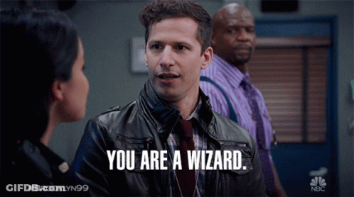 A Man In A Leather Jacket Says " You Are A Wizard " In Front Of A Woman GIF