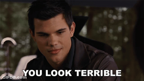 A Man In A Leather Jacket With The Words You Look Terrible Below Him GIF
