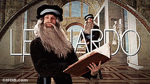 A Man In A Leonardo Costume Holds A Large Book GIF