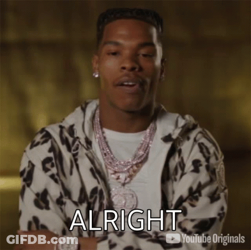 A Man In A Leopard Print Jacket Is Making A Funny Face And Says Alright GIF