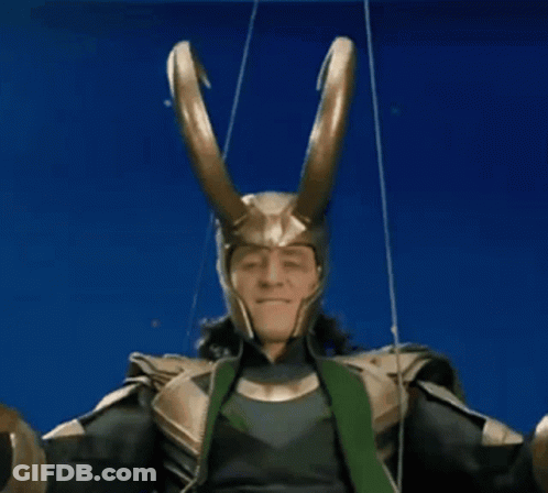A Man In A Loki Costume Is Giving Two Thumbs Up . GIF