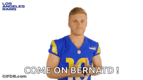 A Man In A Los Angeles Rams Jersey Says Come On Bernard ! GIF