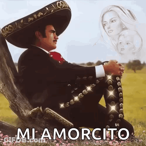 A Man In A Mariachi Outfit Is Sitting On A Tree Branch With The Words " Mi Amorcito " Written Below Him GIF