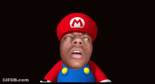 A Man In A Mario Costume With A Red Hat With A White M On It GIF