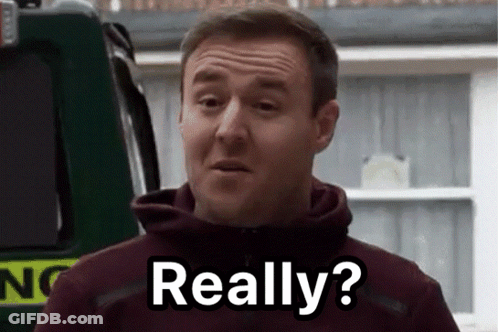 A Man In A Maroon Hoodie Is Standing In Front Of A Green Vehicle And Says Really ? GIF