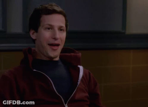 A Man In A Maroon Jacket Is Giving A Thumbs Down GIF