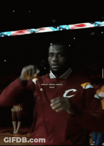 A Man In A Maroon Jacket With The Letter C On His Chest GIF