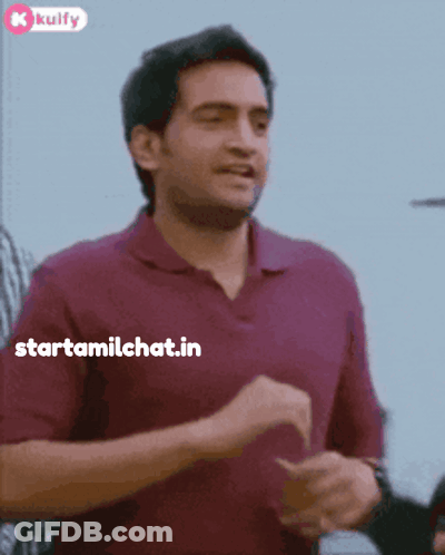 A Man In A Maroon Shirt Is Running With The Words Starttamilchat.in Written On The Bottom GIF
