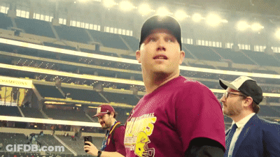 A Man In A Maroon Shirt With A Yellow Simpson On It GIF
