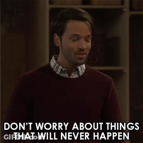 A Man In A Maroon Sweater Says " Don 'T Worry About Things That Will Never Happen " GIF