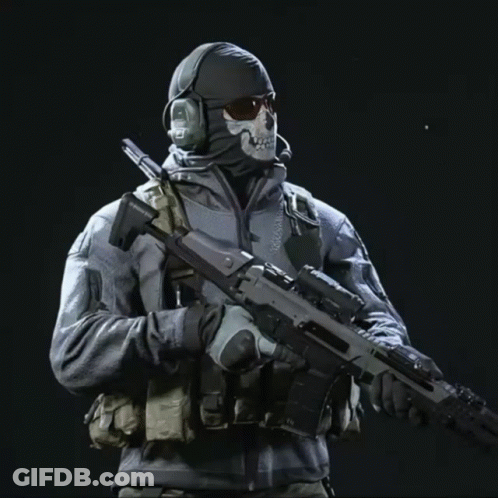 A Man In A Mask Holds A Rifle With The Word Mission On The Side GIF